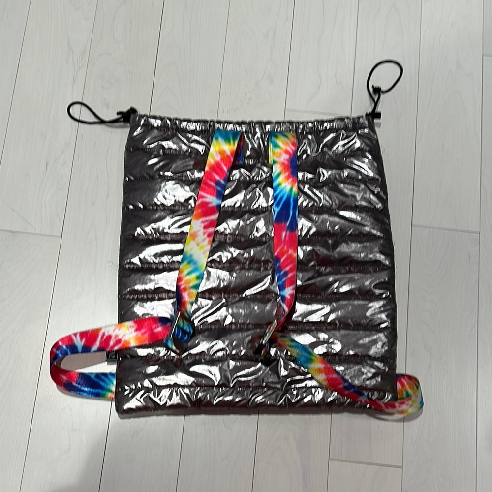 NWOT - Top Trenz metallic silver drawstring Backpack with Rainbow Straps